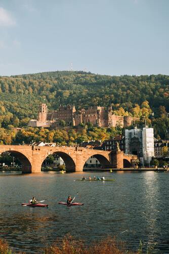 German countryside with traditional half-timbered houses and rolling green hills