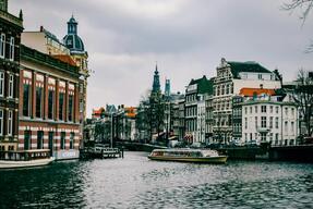 Amsterdam canal houses and historic bridges